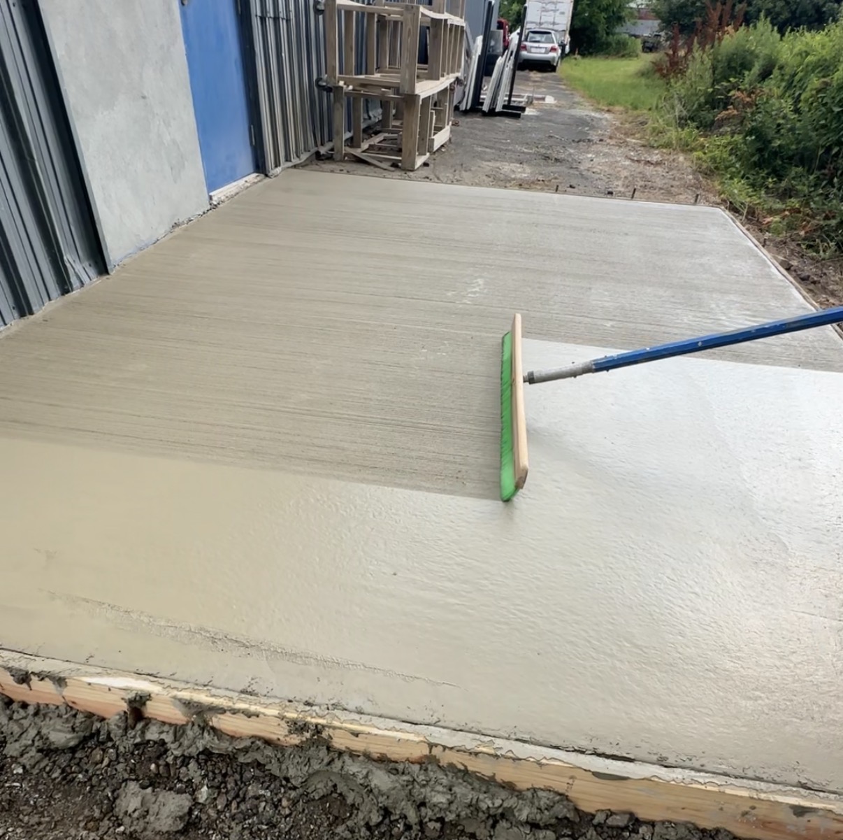 Line striping machine painting parking stalls at a commercial property in Philadelphia, PA